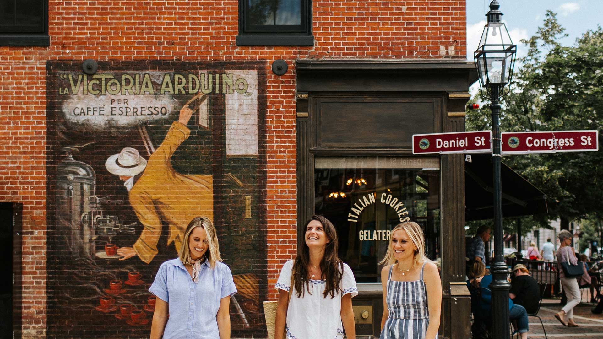 A group of girlfriends stroll through Portsmouth, NH.