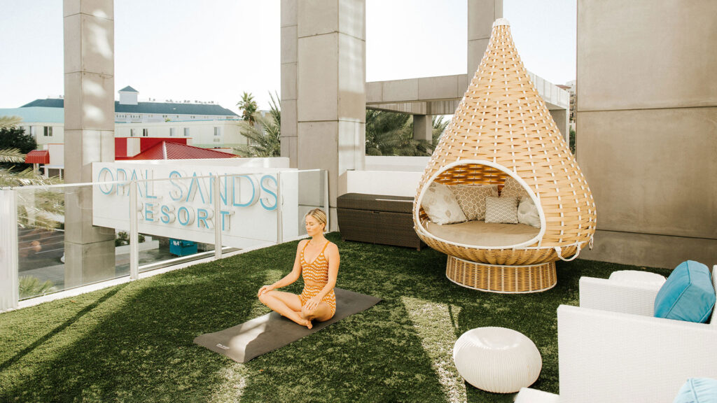 A guest of Opal Sands practices mindfulness at the resort.