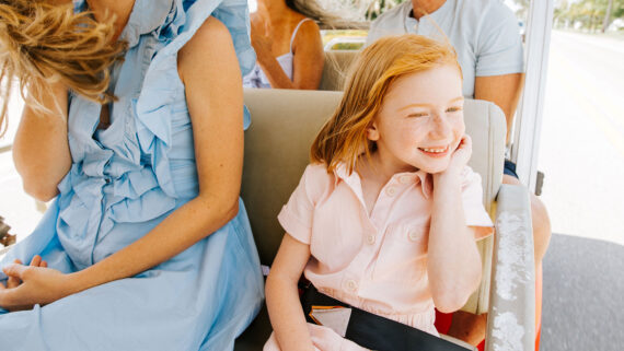 A child smily happily in Naples.
