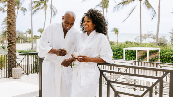 A couple sips tea on the outdoor patio of the Tammy Fender Spa in Delray Beach, Florida.