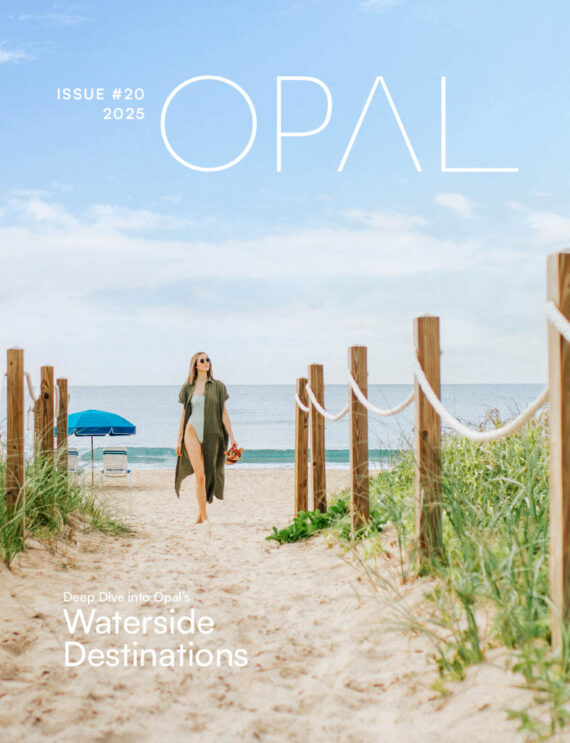 A digital cover of the 2025 issue of Opal Magazine, depicting a woman walking Delray Beach.