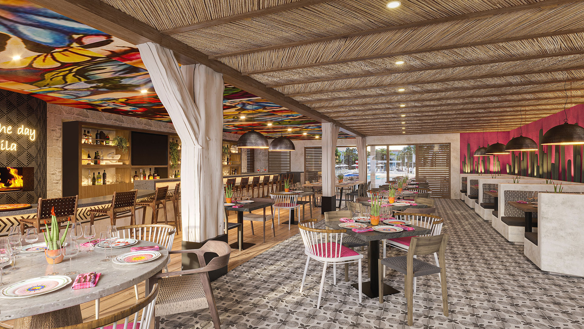 The interior of Opal Key's new Lolitas restaurant, a spacious restaurant with bright, colorful decor, and wooden ceiling.