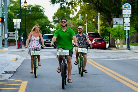 A couple receives a private bike tour through Key West.
