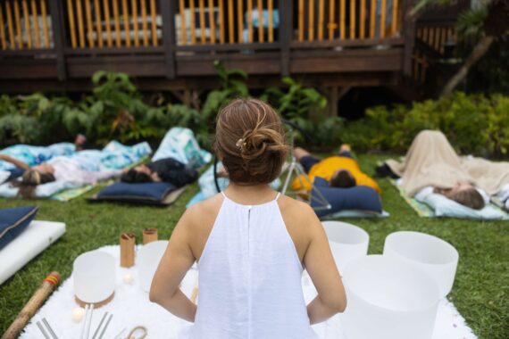 A yoga expert leads a guided meditation.