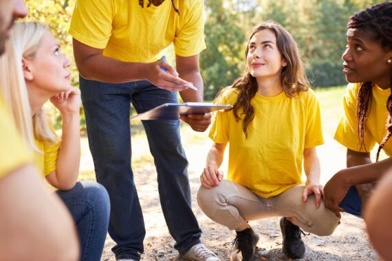 A group in the midst of a corporate scavenger hunt.