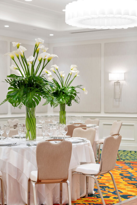 View of a round meeting table with flowers