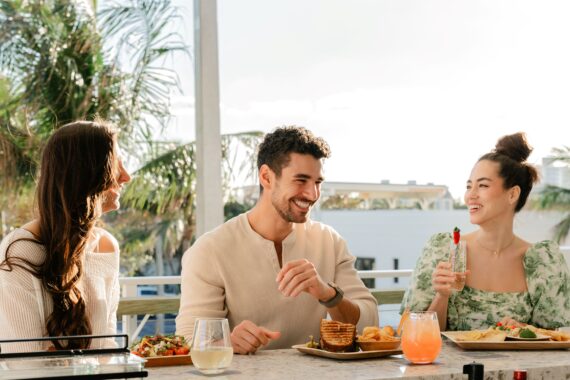 people enjoying their food at elevate