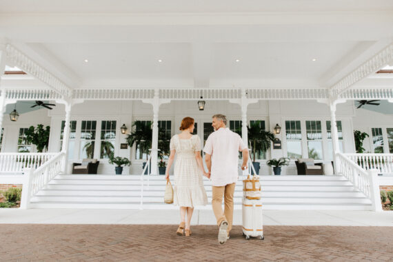 couple with bags checking into the belleview