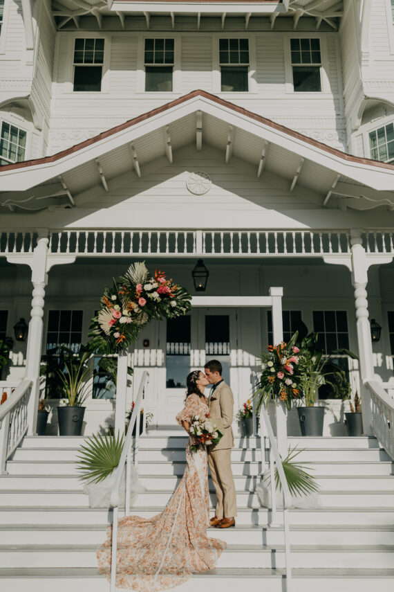 newlywed couple kissing on belleview steps