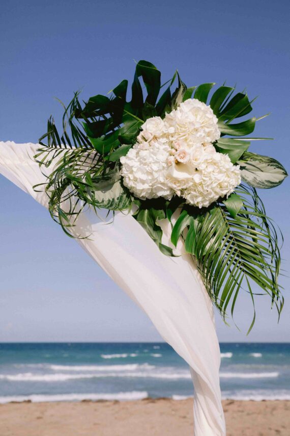 Floral arch for wedding at Hutchinson Shores Resort & Spa